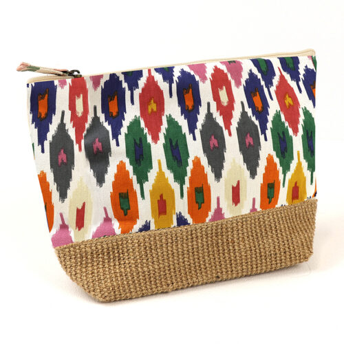 Handwoven cotton travel bag with a diamond ikat pattern, featuring sturdy handles and a spacious interior. Ethically made, lightweight, and perfect for everyday use or weekend getaways.